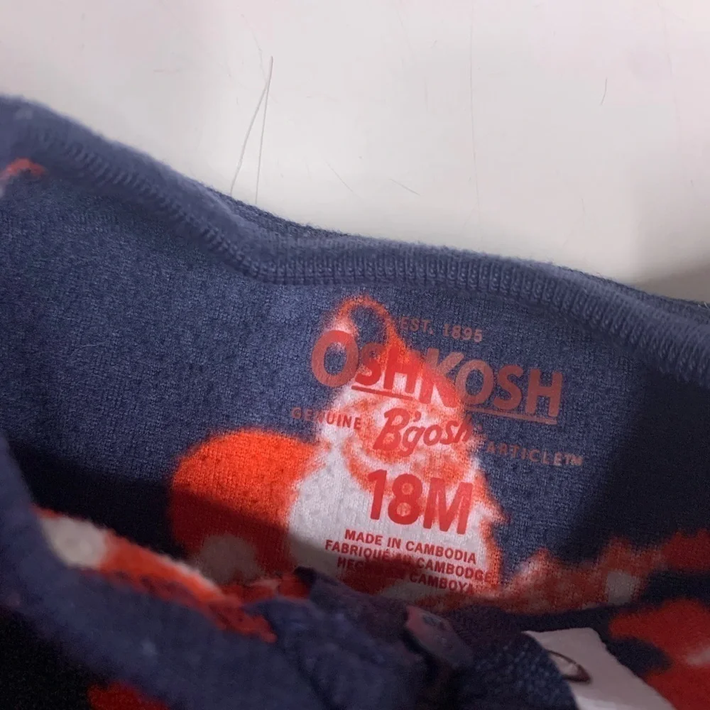 Osh’Gosh Rock and Roll Santa Footed Pajama Onesie